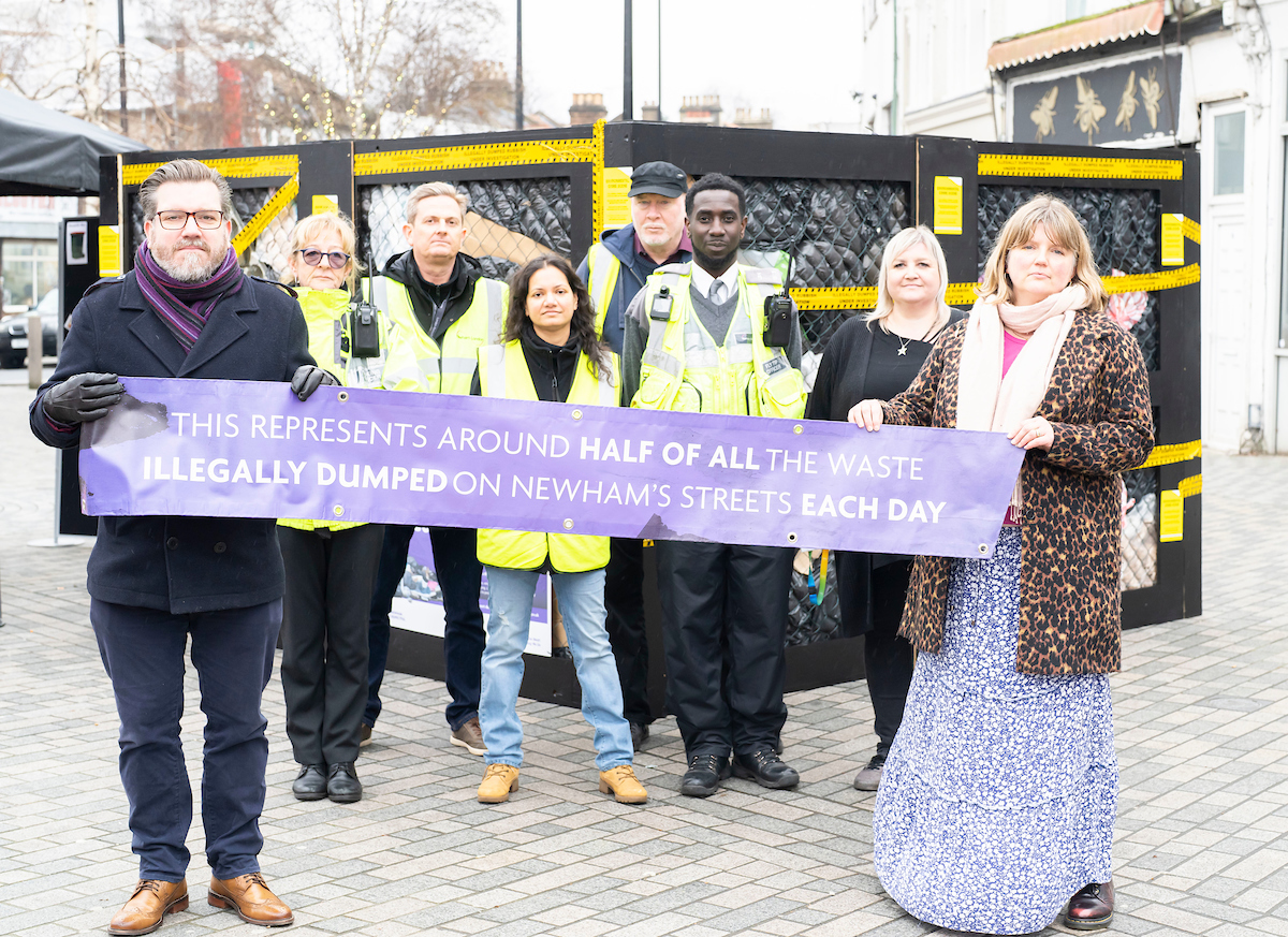 Image showing councillor asser with workers dealing with illegal dumping