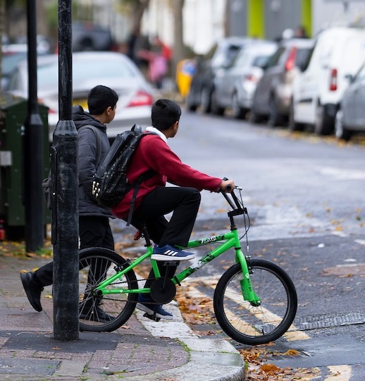 20mph children riding bike on street