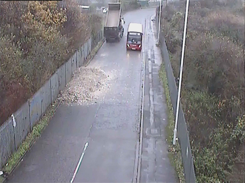 CCTV image showing the waste dumped on the carriage-way