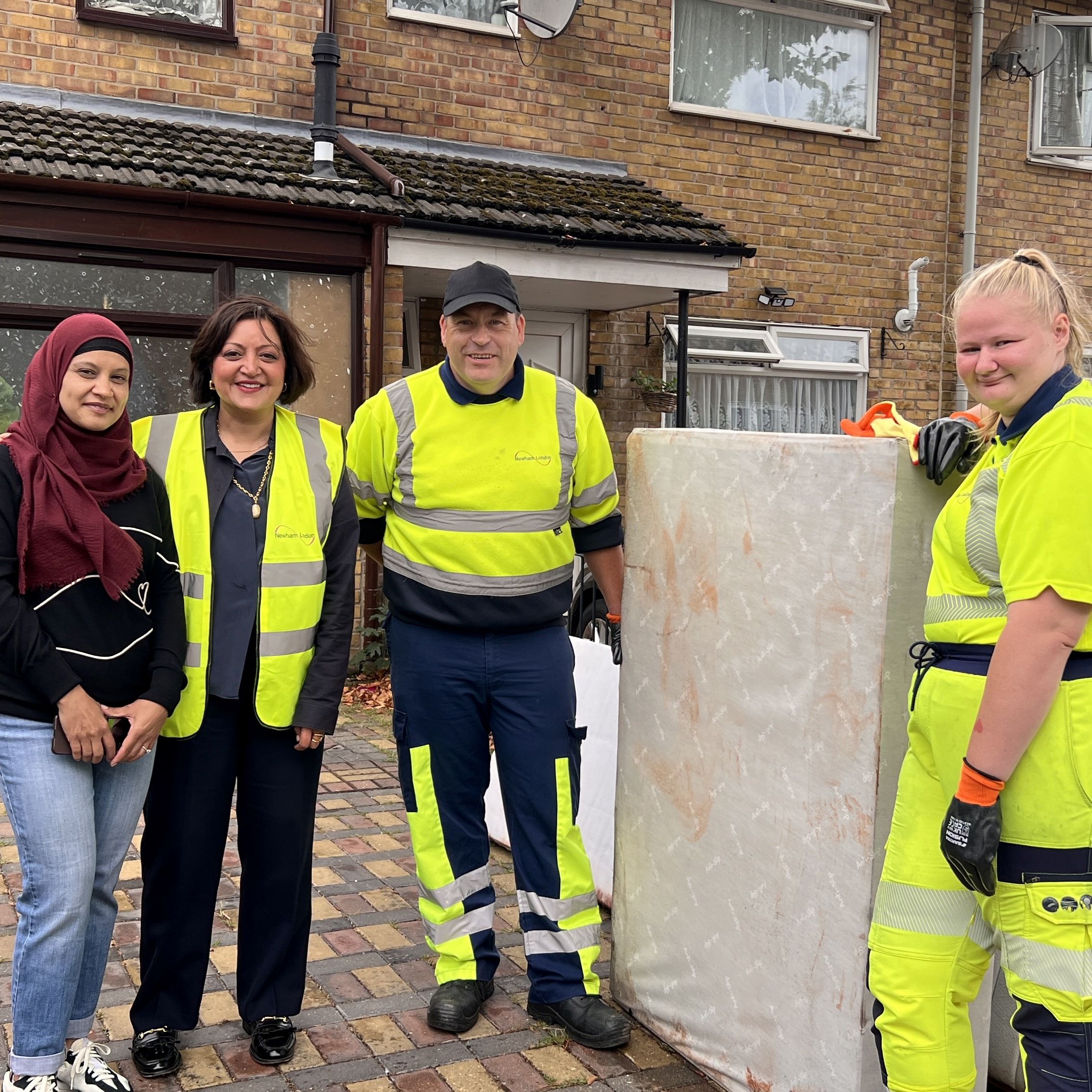 Group shot of mayor and bin men