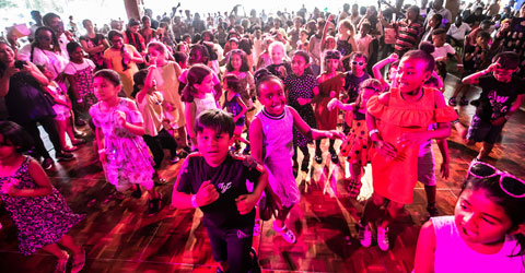 Children celebrating at the Newham show